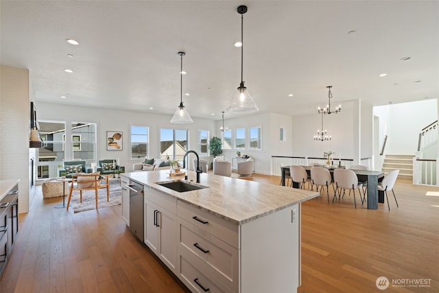 310 W Fir Loop, Washougal, WA 98671 - kitchen featuring dishwasher, light wood-style floors, open floor plan, plenty of natural light, and recessed lighting