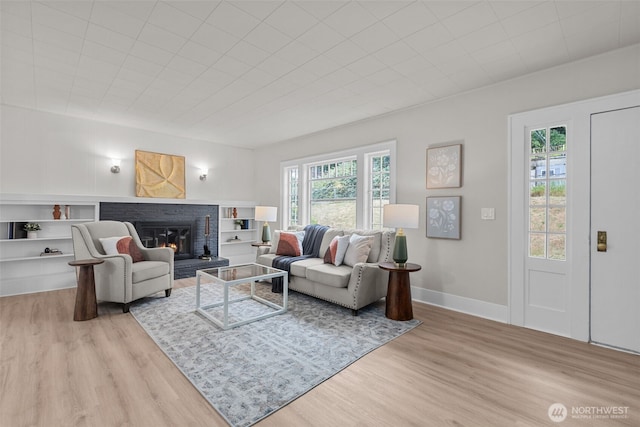 13806 Macadam Rd S, Tukwila, WA 98168 - living room with wood finished floors and a brick fireplace
