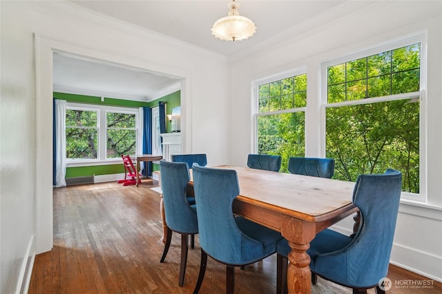 2726 34th Ave S, Seattle, WA 98144 - dining area with plenty of natural light, crown molding, and wood finished floors