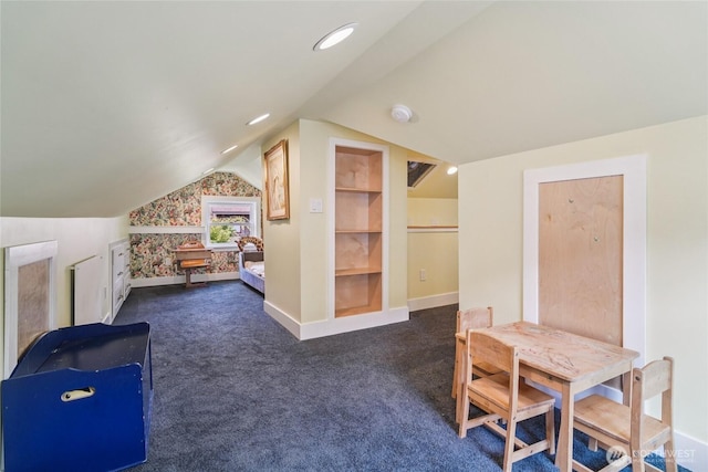 2726 34th Ave S, Seattle, WA 98144 - additional living space featuring vaulted ceiling, dark carpet, and built in shelves