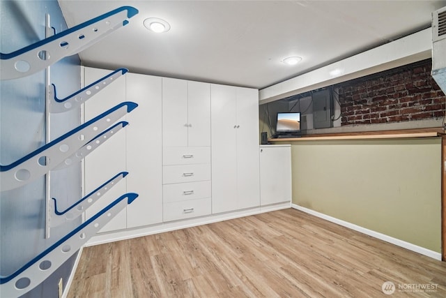 2726 34th Ave S, Seattle, WA 98144 - basement with light wood-style flooring and baseboards