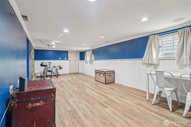 2726 34th Ave S, Seattle, WA 98144 - game room with wainscoting, wood finished floors, crown molding, and recessed lighting