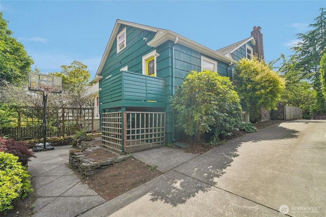 2726 34th Ave S, Seattle, WA 98144 - view of front of home featuring a chimney and stairs
