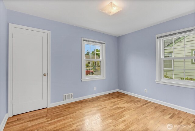 4015 N 13th St, Tacoma, WA 98406 - spare room with light wood-style floors and baseboards