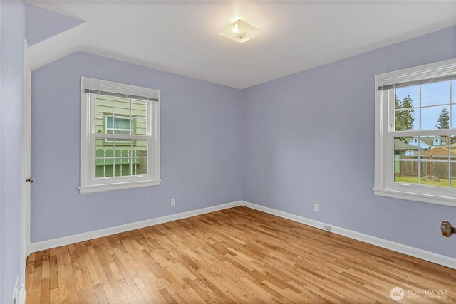 4015 N 13th St, Tacoma, WA 98406 - empty room with light wood-style floors and baseboards