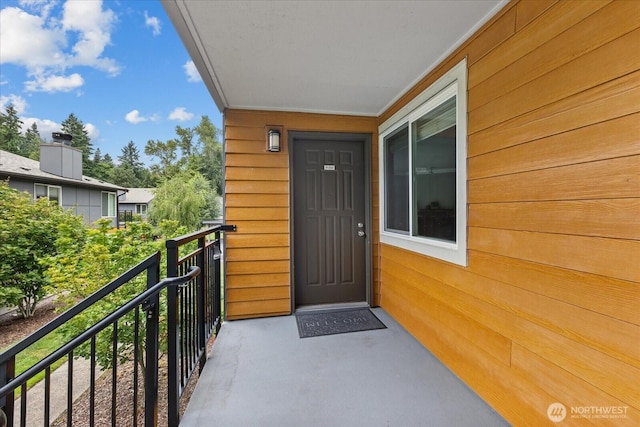 10831 NE 147th Ln Unit R202, Bothell, WA 98011 - property entrance with a balcony