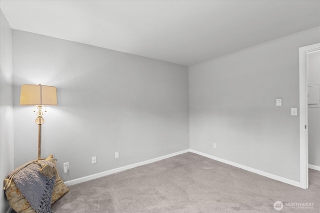 10831 NE 147th Ln Unit R202, Bothell, WA 98011 - unfurnished room featuring baseboards and carpet floors