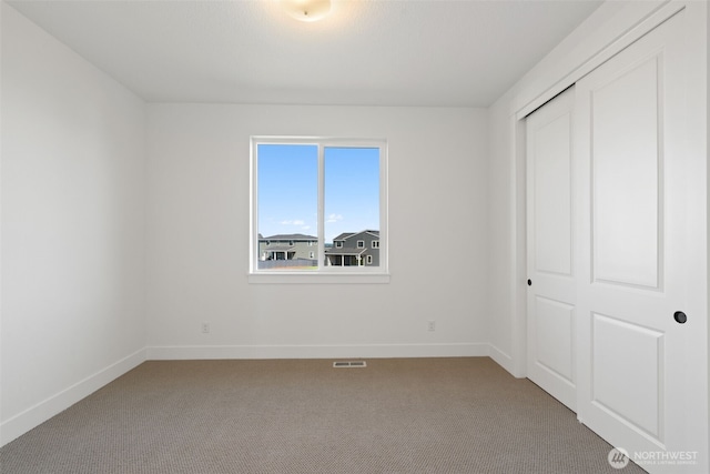 382 W Fir Loop, Washougal, WA 98671 - unfurnished bedroom featuring light colored carpet and a closet