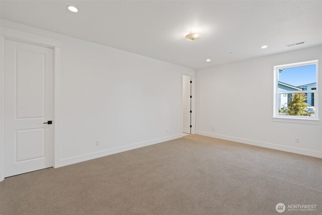 382 W Fir Loop, Washougal, WA 98671 - unfurnished room featuring light carpet and recessed lighting