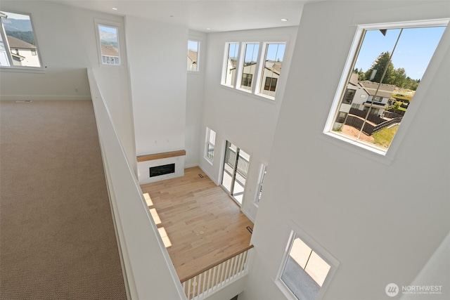 382 W Fir Loop, Washougal, WA 98671 - staircase with plenty of natural light, recessed lighting, a fireplace, and a high ceiling