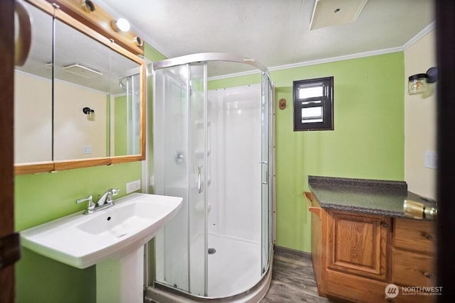 4960 SW Daisy St, Port Orchard, WA 98367 - full bath featuring a stall shower, wood finished floors, and crown molding