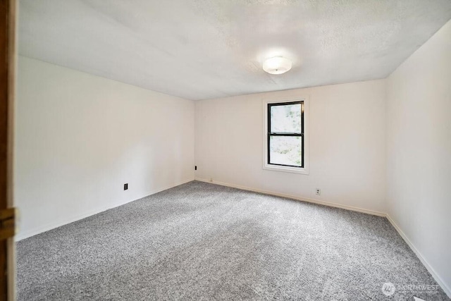4960 SW Daisy St, Port Orchard, WA 98367 - unfurnished room featuring carpet and a textured ceiling