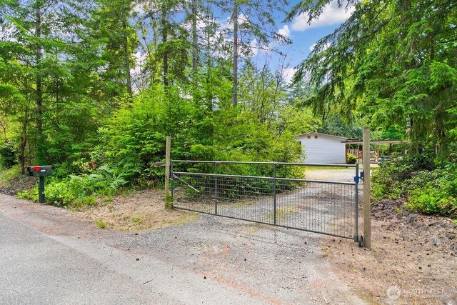 4960 SW Daisy St, Port Orchard, WA 98367 - gate featuring a storage shed