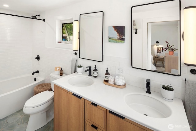 10426 SW 112th St, Vashon, WA 98070 - bathroom featuring double vanity, tub / shower combination, backsplash, and tile walls