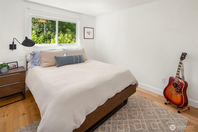 10426 SW 112th St, Vashon, WA 98070 - bedroom with wood finished floors and baseboards
