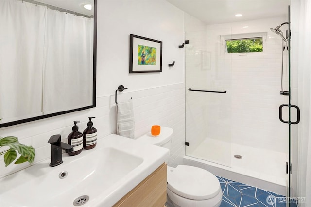 10426 SW 112th St, Vashon, WA 98070 - bathroom with a shower stall, vanity, and tile walls