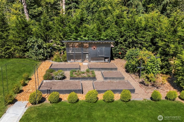 10426 SW 112th St, Vashon, WA 98070 - view of green lawn featuring a vegetable garden