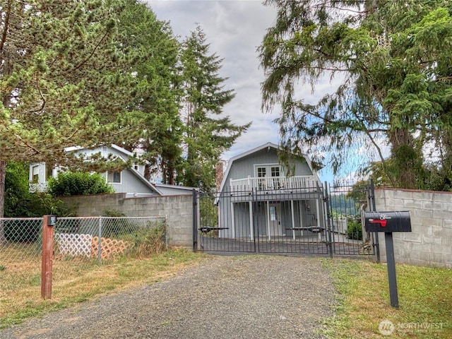 81 E Panorama Way, Grapeview, WA 98546 - view of front of property featuring a gate and a fenced front yard