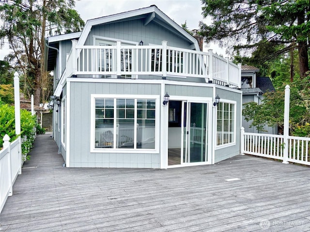 81 E Panorama Way, Grapeview, WA 98546 - rear view of house featuring a balcony and a deck