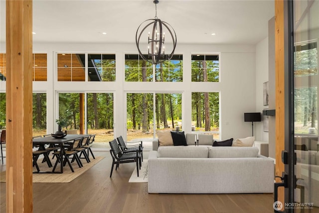1950 Wanawish Loop, Cle Elum, WA 98922 - living area with a chandelier, wood finished floors, recessed lighting, and a towering ceiling