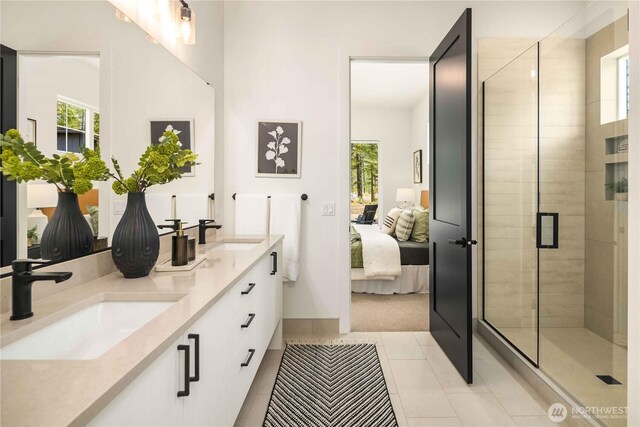 1950 Wanawish Loop, Cle Elum, WA 98922 - full bath featuring ensuite bathroom, double vanity, healthy amount of natural light, and a stall shower