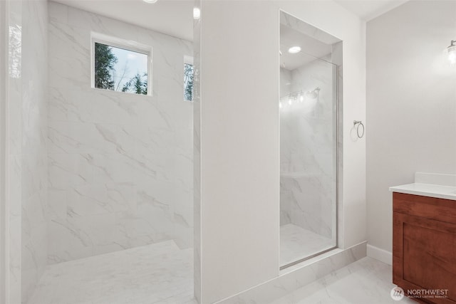 13600 100th St NE Unit 212, Lake Stevens, WA 98258 - bathroom with marble finish floors, a marble finish shower, and vanity