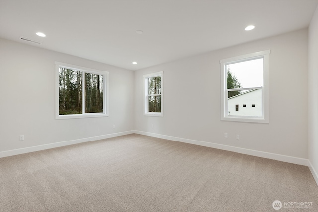 13600 100th St NE Unit 212, Lake Stevens, WA 98258 - unfurnished room featuring light carpet, plenty of natural light, and recessed lighting
