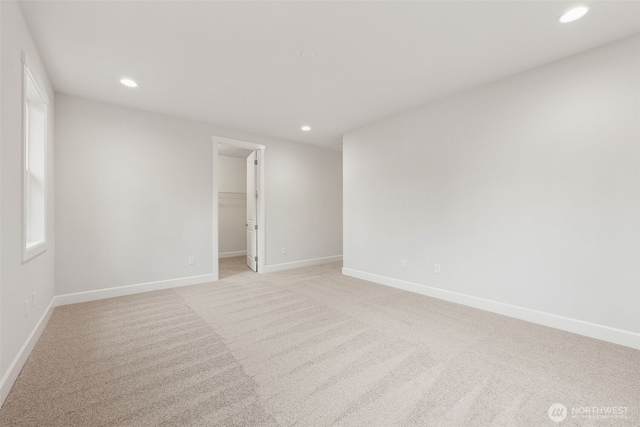 13600 100th St NE Unit 212, Lake Stevens, WA 98258 - unfurnished room featuring light colored carpet and recessed lighting