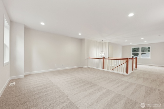 13600 100th St NE Unit 212, Lake Stevens, WA 98258 - unfurnished room featuring light carpet and recessed lighting