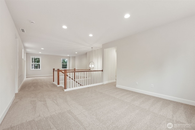13600 100th St NE Unit 212, Lake Stevens, WA 98258 - empty room featuring light carpet and recessed lighting