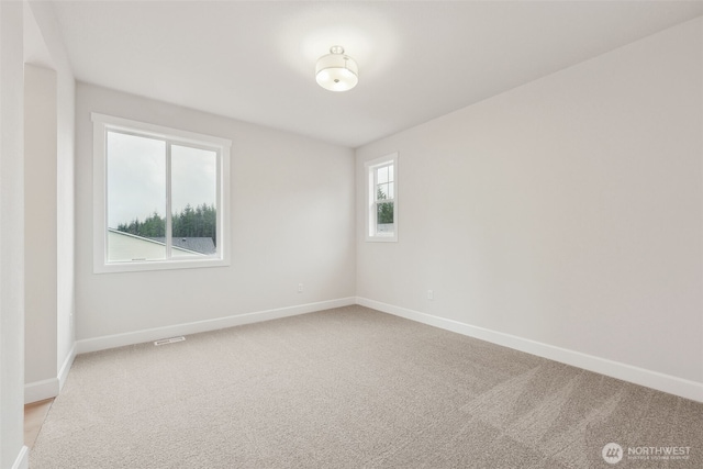 13600 100th St NE Unit 212, Lake Stevens, WA 98258 - unfurnished room with light carpet and baseboards
