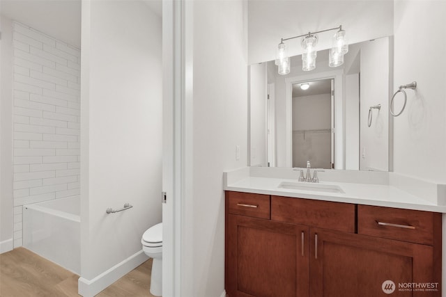 13600 100th St NE Unit 212, Lake Stevens, WA 98258 - full bathroom featuring vanity, wood finished floors, and bathtub / shower combination