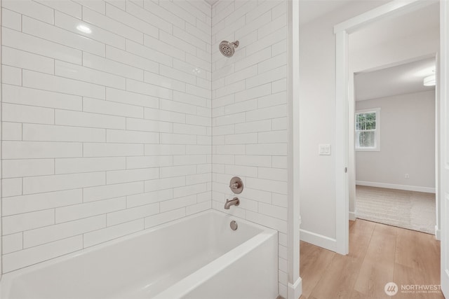 13600 100th St NE Unit 212, Lake Stevens, WA 98258 - bathroom featuring wood finished floors and shower / bathtub combination
