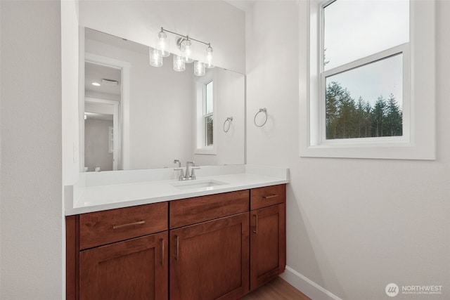 13600 100th St NE Unit 212, Lake Stevens, WA 98258 - bathroom featuring vanity and baseboards