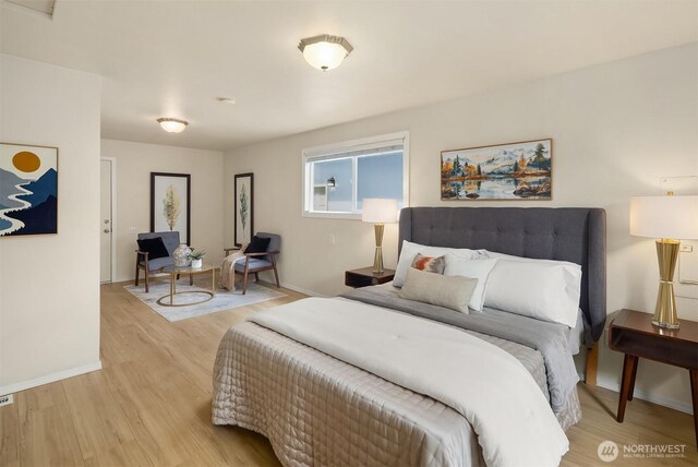 15484 174th Ave SE, Monroe, WA 98272 - bedroom with light wood-type flooring and baseboards