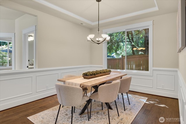 6555 125th Ave NE, Kirkland, WA 98033 - dining space featuring a chandelier, plenty of natural light, crown molding, a wainscoted wall, and dark wood-style flooring