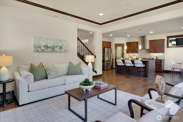 6555 125th Ave NE, Kirkland, WA 98033 - living area featuring recessed lighting, stairs, dark wood finished floors, and ornamental molding