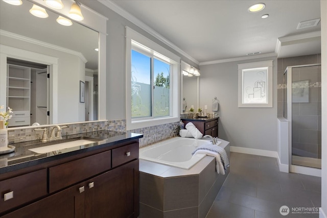 6555 125th Ave NE, Kirkland, WA 98033 - full bath with a stall shower, vanity, a garden tub, tasteful backsplash, and tile patterned floors