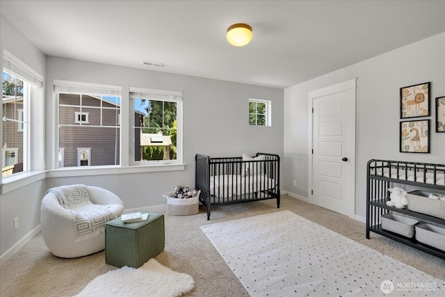 6555 125th Ave NE, Kirkland, WA 98033 - bedroom with carpet and a crib