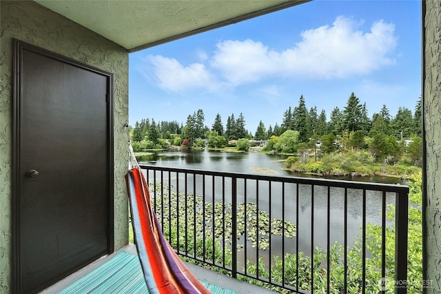 615 75th St SE Unit C43, Everett, WA 98203 - balcony featuring a water view and view of scattered trees
