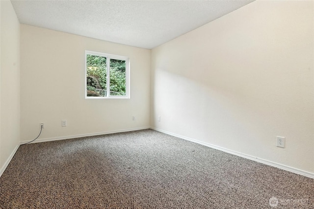 615 75th St SE Unit C43, Everett, WA 98203 - unfurnished room featuring carpet flooring and a textured ceiling