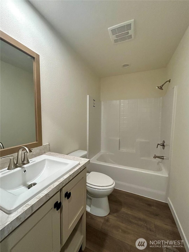 40 E Skywater Pl, Shelton, WA 98584 - bathroom featuring vanity, wood finished floors, and shower / tub combination