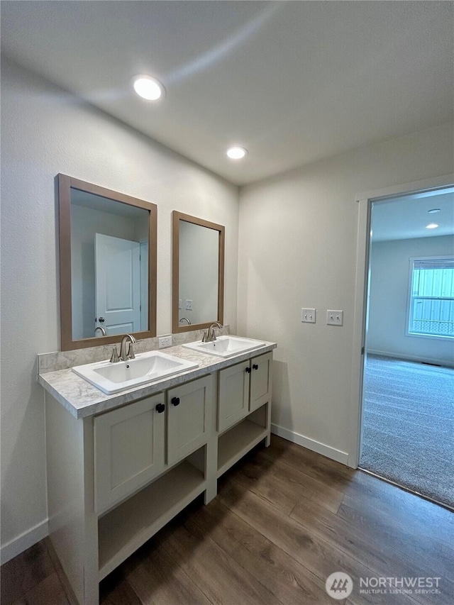 40 E Skywater Pl, Shelton, WA 98584 - bathroom with wood finished floors, double vanity, and recessed lighting