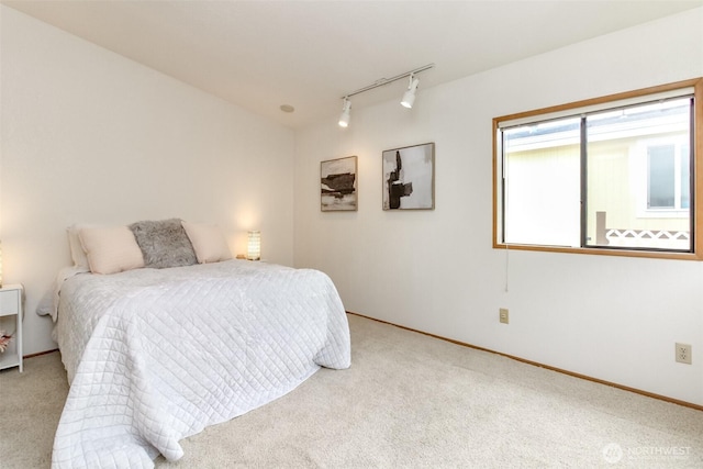 37301 28th Ave S Unit 34, Federal Way, WA 98003 - carpeted bedroom featuring track lighting and baseboards