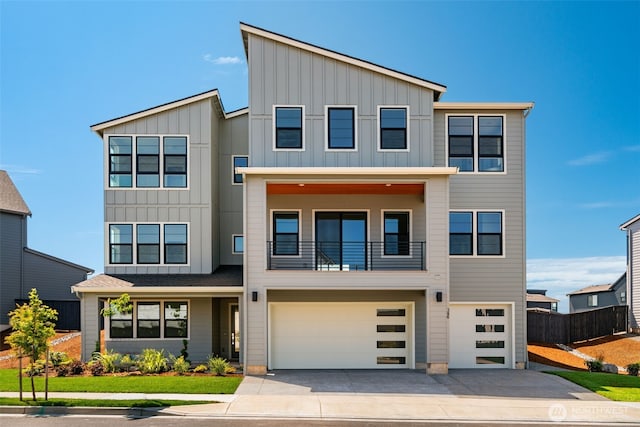 386 W Fir Loop, Washougal, WA 98671 - contemporary home with board and batten siding, an attached garage, concrete driveway, and a balcony