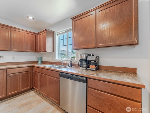 2135 Roper Ln, Wenatchee, WA 98801 - kitchen with stainless steel dishwasher, light wood-style flooring, brown cabinets, and recessed lighting
