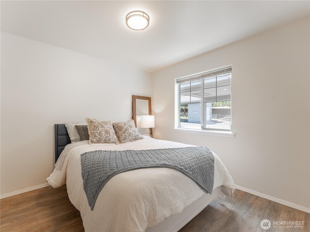 2135 Roper Ln, Wenatchee, WA 98801 - bedroom featuring baseboards and wood finished floors