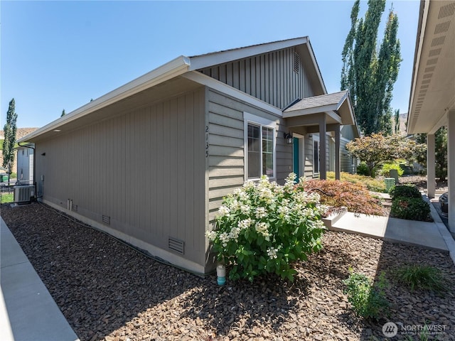 2135 Roper Ln, Wenatchee, WA 98801 - view of side of home with crawl space and a cooling unit