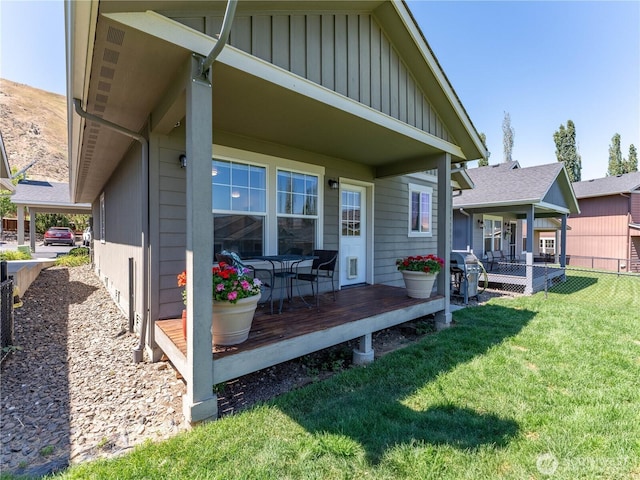 2135 Roper Ln, Wenatchee, WA 98801 - rear view of house featuring board and batten siding and a wooden deck