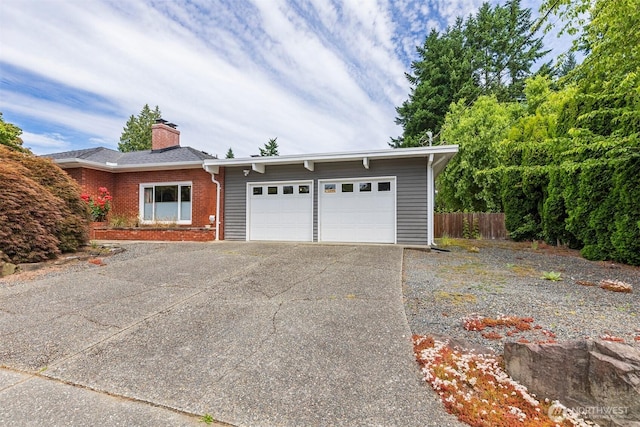 7923 220th St SW, Edmonds, WA 98026 - view of front of home with a garage, concrete driveway, brick siding, and a chimney